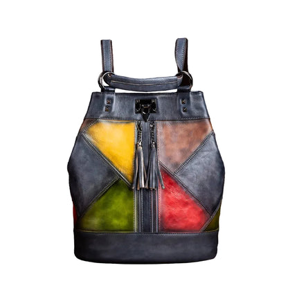 Multicolored patchwork bag with tassels on a brown textured background