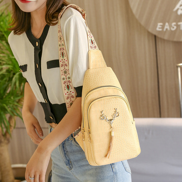Urban Minimalist Crossbody Sling Bag with Deer Tassel